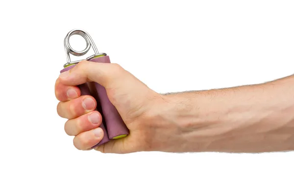 Man holding a purple hand trainer — Stock Photo, Image