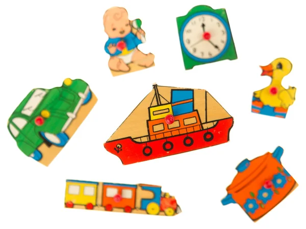 Piece of an antique wooden puzzle for children — Stock Photo, Image