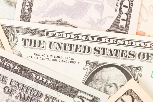 Mehrere Papier amerikanische Dollar isoliert — Stockfoto
