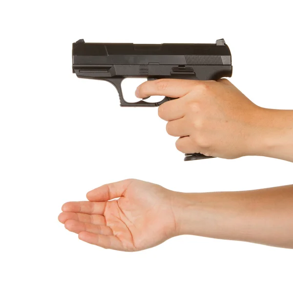 Woman threatening with a black gun — Stock Photo, Image