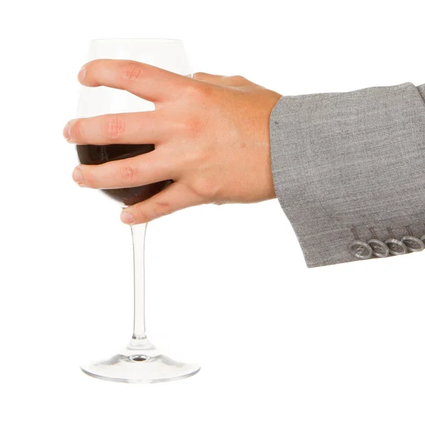 Business woman holding a glass of red wine — Stock Photo, Image
