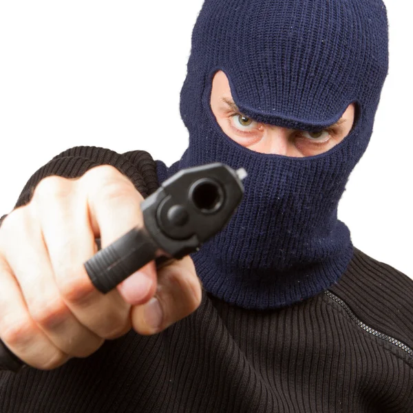 Фото террориста с пистолетом — стоковое фото