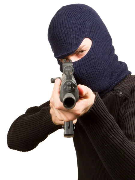 Фото террориста с пистолетом — стоковое фото