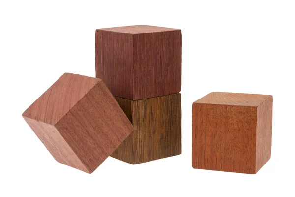 Plusieurs vieux cubes de bois, utilisés par les enfants pour la construction — Photo