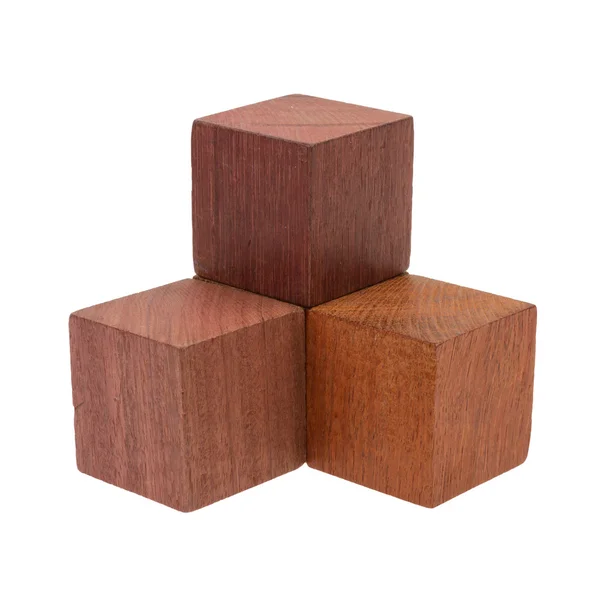 Several old cubes of wood, used by children for building — Stock Photo, Image