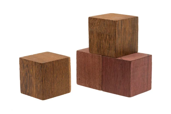 Plusieurs vieux cubes de bois, utilisés par les enfants pour la construction — Photo