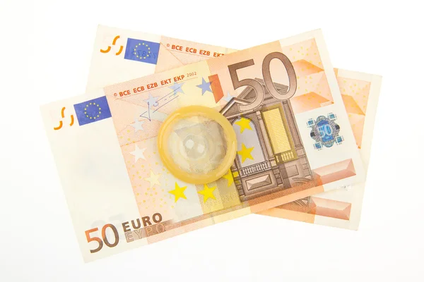 Condom on two 50 euro bills — Stock Photo, Image