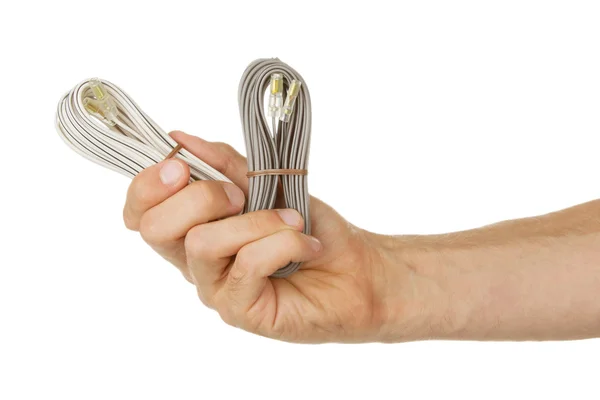 Speaker cable in a hand, isolated — Stock Photo, Image