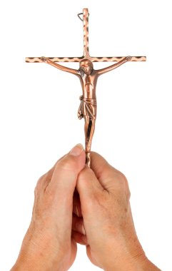 eski izole bir pirinç Katolik haç tutan kadın