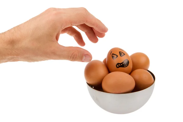 Scared egg, waiting to be grabbed by a hand — Stock Photo, Image