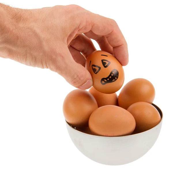 Scared egg, waiting to be grabbed by a hand — Stock Photo, Image