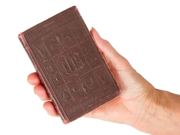 Gamla hand (kvinna) som håller en mycket gammal bibel — Stockfoto