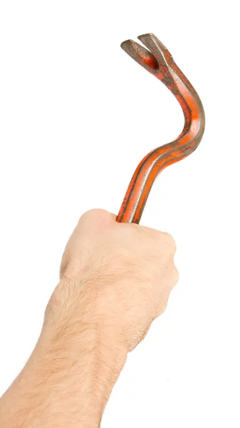 Hand som håller gamla röda kofot — Stockfoto
