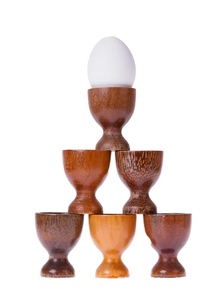 Conjunto de diferentes tazas de huevo de madera —  Fotos de Stock