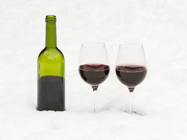 Bottle of red wine and wineglasses isolated — Stock Photo, Image