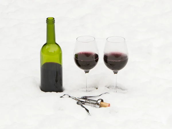 Bottle of red wine and wineglasses isolated — Stock Photo, Image