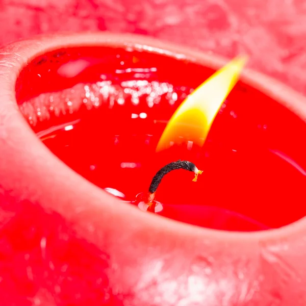 Close-up de uma vela vermelha — Fotografia de Stock