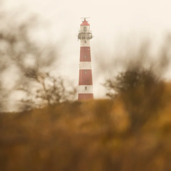 Red and white lighthouse — Stock Photo, Image