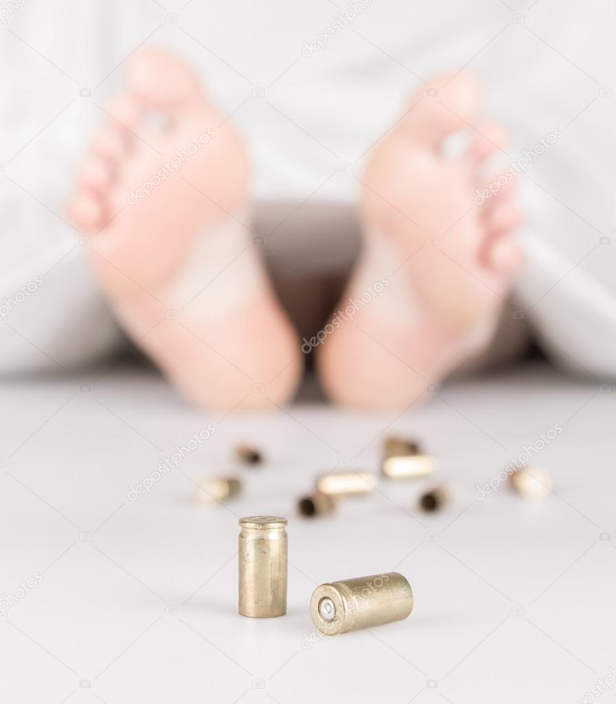 Dead body with bullets