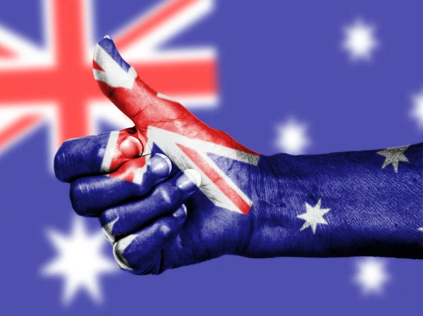 Australian flag on thumbs up hand — Stock Photo, Image