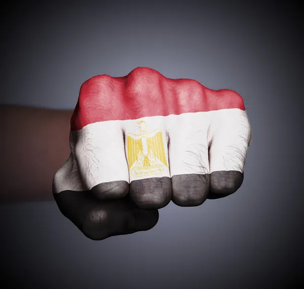 Front view of punching fist on gray background — Stock Photo, Image