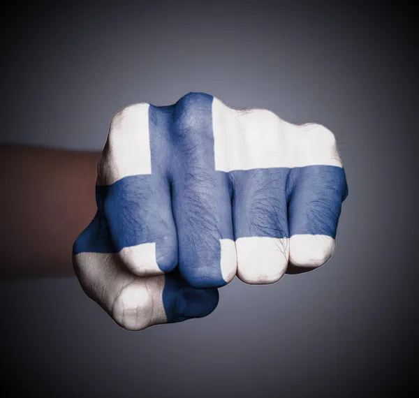 Front view of punching fist on gray background — Stock Photo, Image