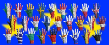 Hands with flag painting of the EU-coutries clipart