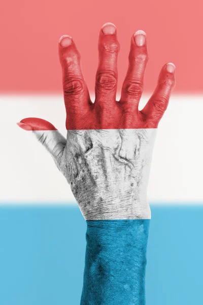 Old hand with flag, European Union, Luxembourg — Stock Photo, Image