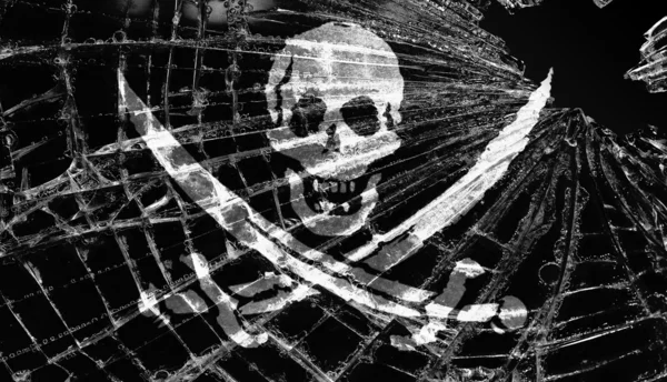 Pirate flag under broken ice or glass — Stock Photo, Image