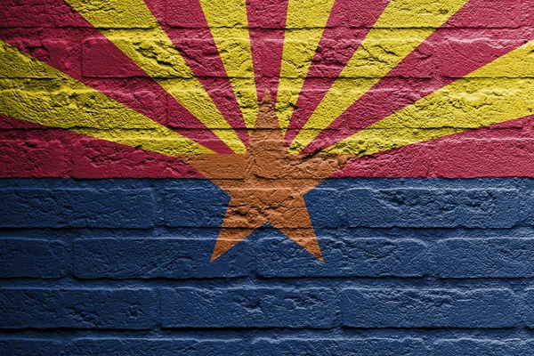 Muro de ladrillo con una pintura de una bandera, Florida —  Fotos de Stock