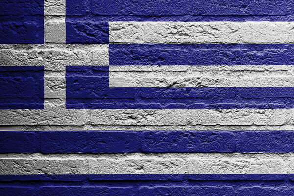 Brick wall with a painting of a flag