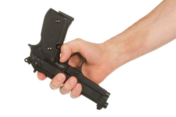 Disarming, hand giving a gun — Stock Photo, Image