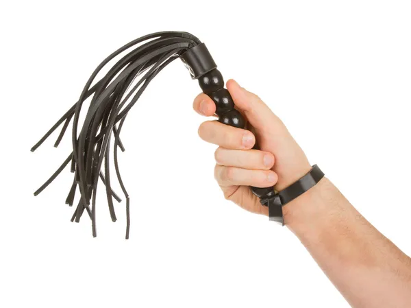 Strict Black Leather Flogging Whip in man's hand — Stock Photo, Image