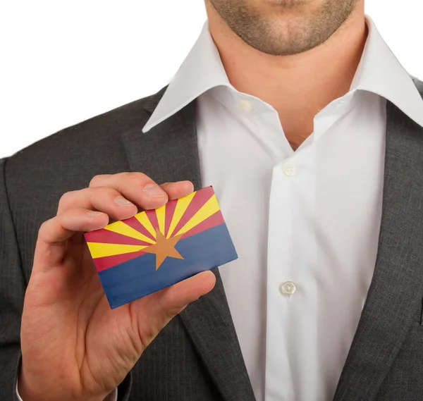 Businessman is holding a business card, Arizona — Stock Photo, Image