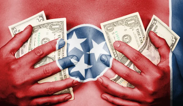 Sweaty girl covered her breast with money, flag of Tennessee — Stock Photo, Image