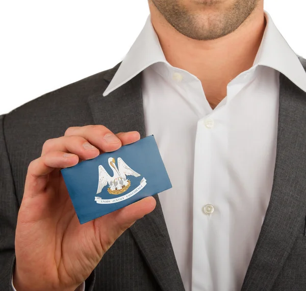 Businessman is holding a business card, Louisiana — Stock Photo, Image