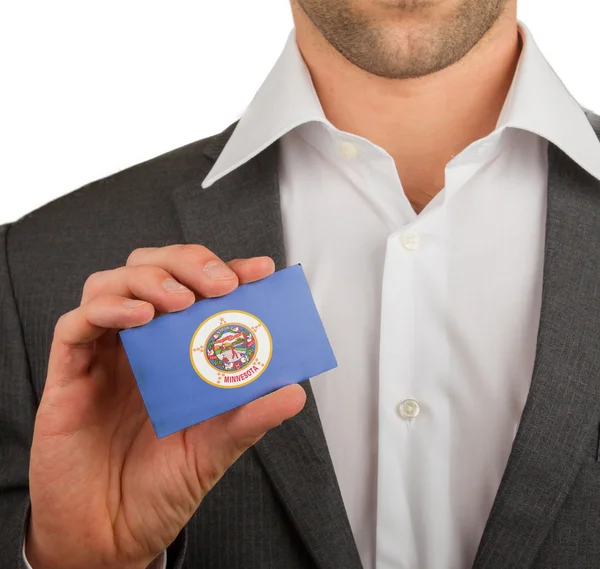 Businessman is holding a business card, Minnesota — Stock Photo, Image