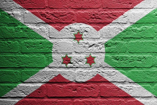 Parede de tijolo com uma pintura de uma bandeira, Burundi — Fotografia de Stock