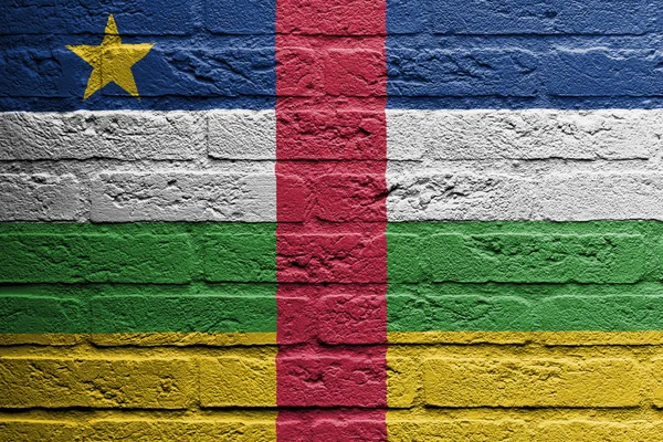 Bakstenen muur met een schilderij van een vlag, Centraal-Afrikaanse Republiek — Stockfoto