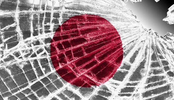 Разбитый лед или стекло с рисунком флага, Япония — стоковое фото