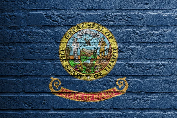 Кирпичная стена с изображением флага, Айдахо — стоковое фото