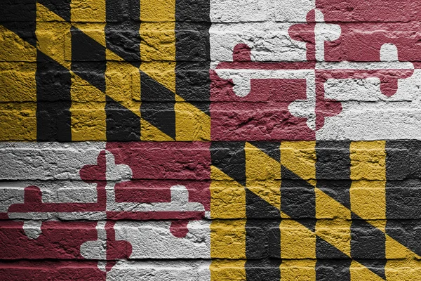 Muro di mattoni con un dipinto di una bandiera, Maryland — Foto Stock