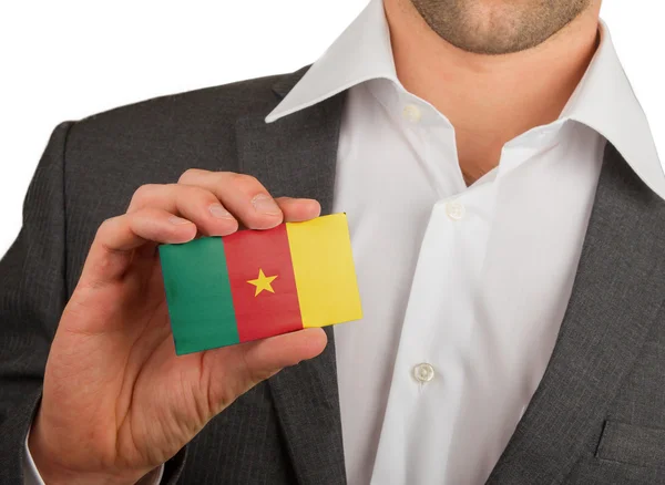 Businessman is holding a business card, Cameroon — Stock Photo, Image