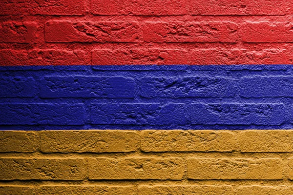 Muro de ladrillo con una pintura de una bandera, Armenia —  Fotos de Stock