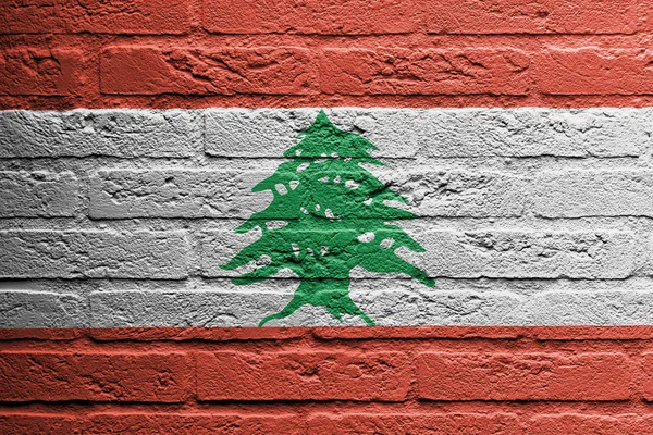 Parede de tijolo com uma pintura de uma bandeira, Líbano — Fotografia de Stock