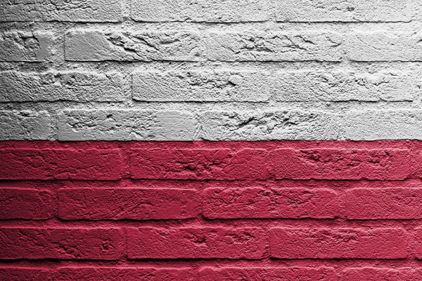 Brick wall with a painting of a flag, Poland — Stock Photo, Image