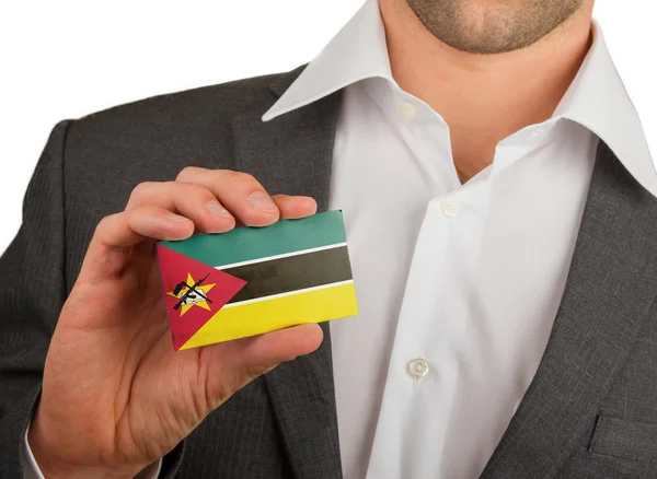 Businessman is holding a business card, Mozambique — Stock Photo, Image