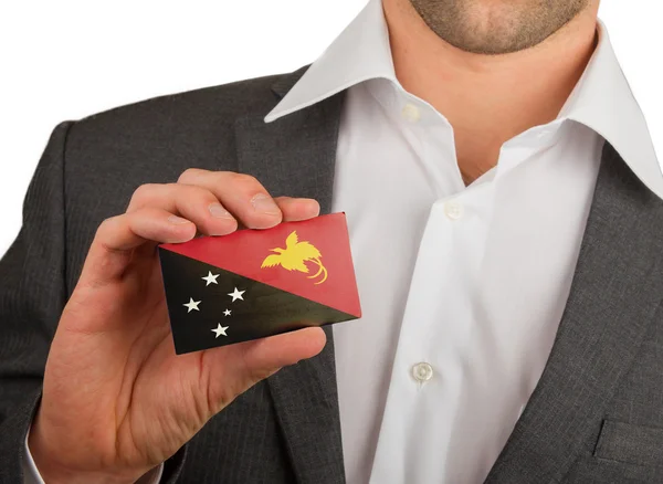 El hombre de negocios tiene una tarjeta de visita, Papúa Nueva Guinea — Foto de Stock