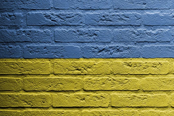 Tegelvägg med en målning av en flagga, Ukraina — Stockfoto