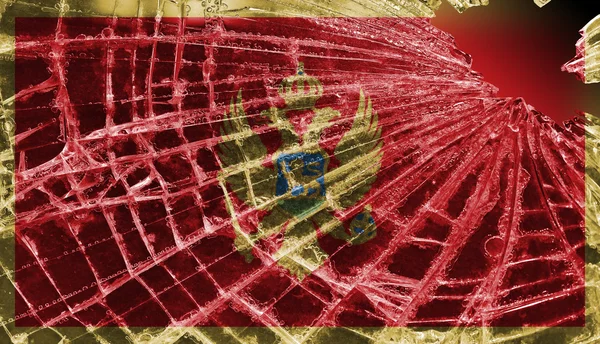 Potłuczone szkło lub lodu z flagą, Czarnogóra — Zdjęcie stockowe